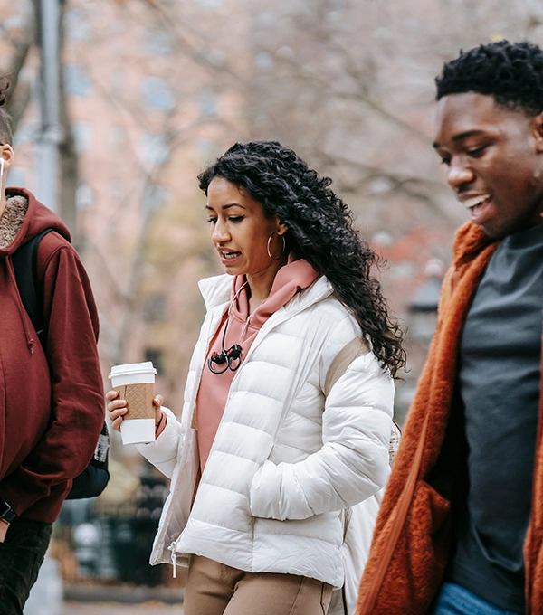A group of young people smiling together